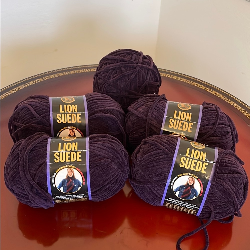 Luxurious Lion Yarn in Eggplant. Selling 5 skeins as one item. DISCONTINUED. NWT
